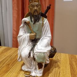 Vintage Mudman Dressed In White Sitting On Rock Figurine