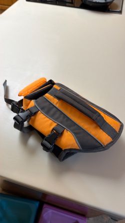 Orange small dog or cat life vest for swimming