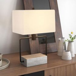 Holden 22-3/4 in. Blackened Bronze and Concrete Table Lamp

About This Product:
Grounded in concrete, this clean, contemporary design is both light an