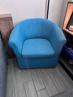 Turquoise swivel chair
