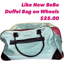 Like New Bebe Duffel Bag On Wheels 