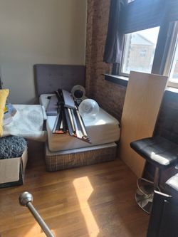 Grey twin bed frame and mattress