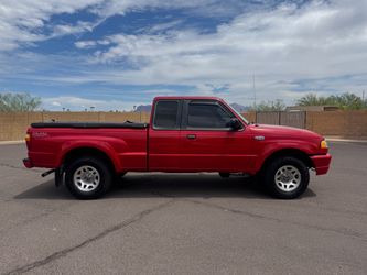 2002 Mazda B3000 duel sport extended cab pick up truck