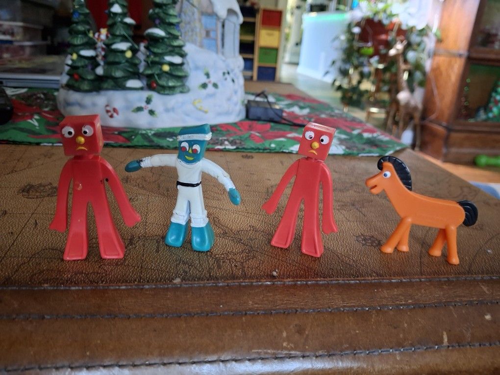 Four Gumby Figures