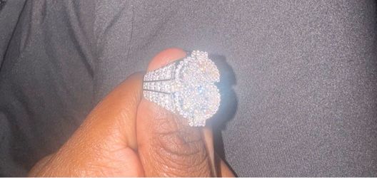 “Moissanite Dollar Sign Ring”