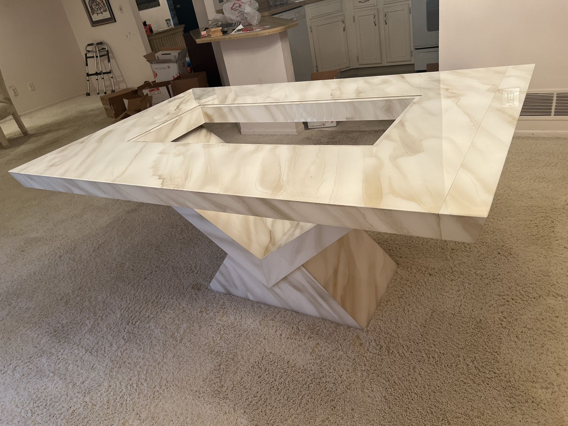 Modern dining room table with extension leaves