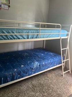 Bunk bed twin size white color .