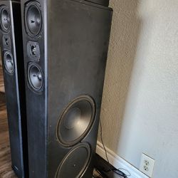 High-end Definitive Technology super tower speakers and center speaker. All have built-in powered subwoofer, for Home Theater