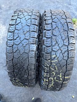 Set of 2 nice tires LT235/80/17 ( We install & balance)