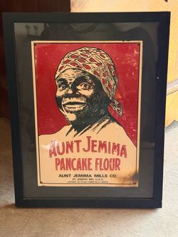 Vintage metal signs framed