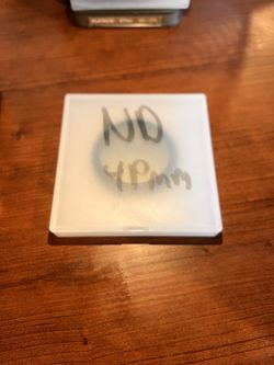 Three 49mm lens filters