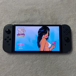 SWITCH OLED with 125 SWITCH GAMES AND 7000 CLASSIC GAMES