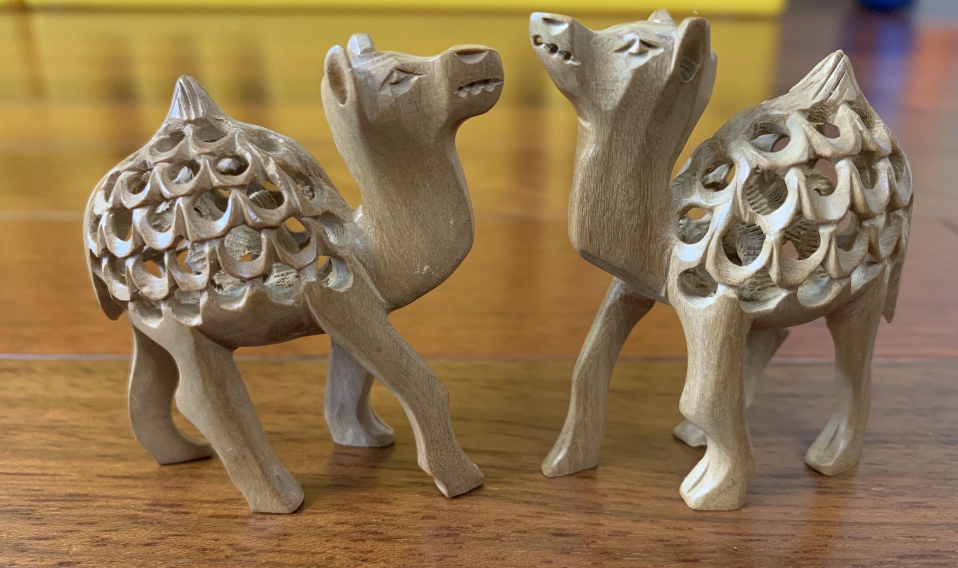 Sandalwood carved camels - 2 pieces small
