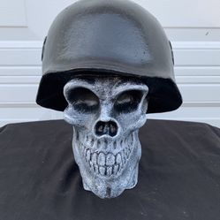Skull wearing a helmet Statue 