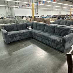 Corduroy Dark Grey Sectional.  New Sectional  4-pc     Nuevo Seccional  De 4 Piezas Color Gris. Oscuro  4-Piece Sectional Set New sectional in a box  