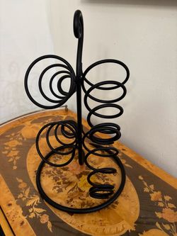 Black wrought iron spiral Mcm wine bottle holder