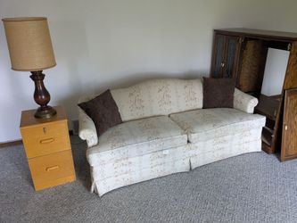 Couch entertainment cabinet and lamp