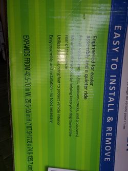 Universal pet barrier for vehicle