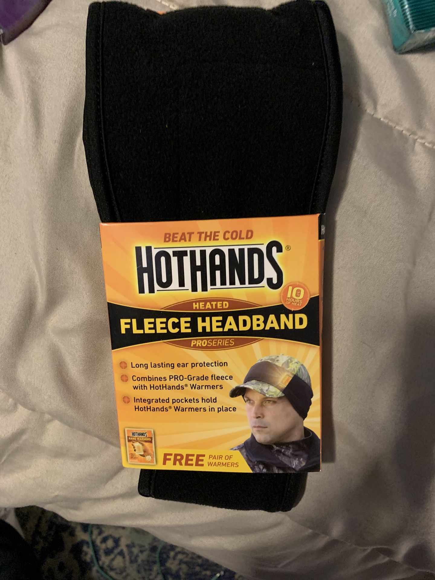 Hot hands fleece headband to beat the cold hand warmers included