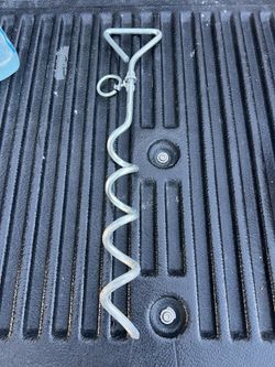 spiral dog tie-out stake used to secure pets outdoors dogs