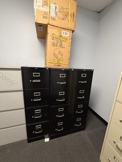 Filing cabinets and big table 10 feet long