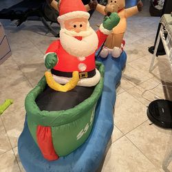 Holiday Living Santa & Waterskiing Reindeer Inflatable (3.7’ x 6.9’)