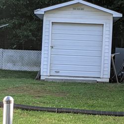 Building With Metal Roll-up Door
