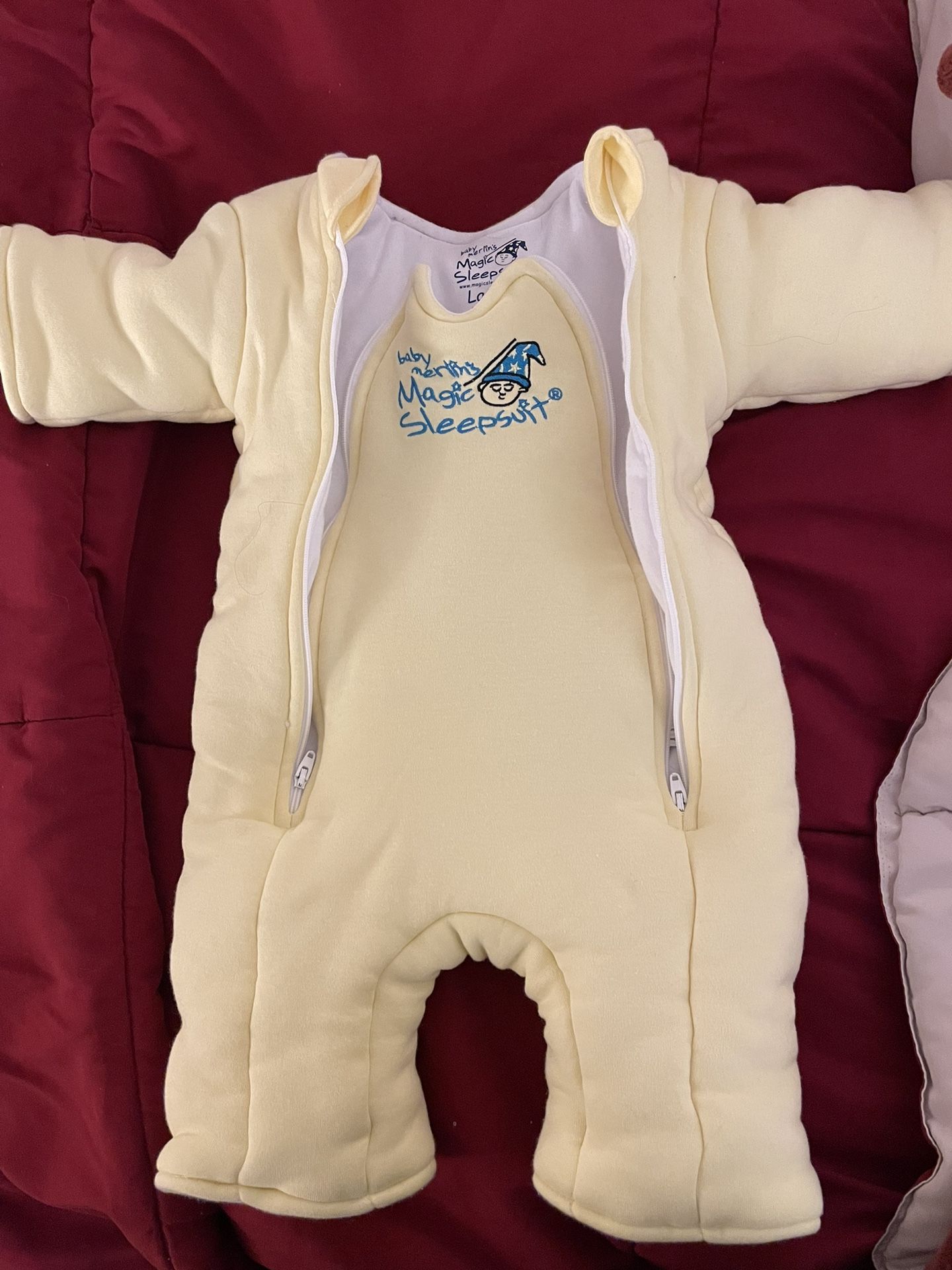 baby merlin sleep suit and size 1 diapers