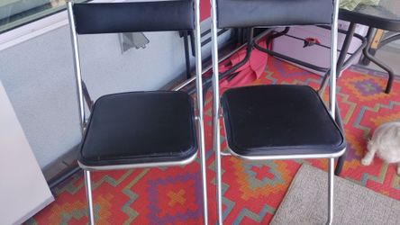 Available until they say sold! New low price$28 for two chairs easy easy fold great for patio or balcony had it on my balcony take to Beach or events