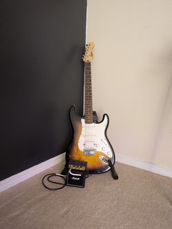 Squier Stratocaster with Marshalls Amp