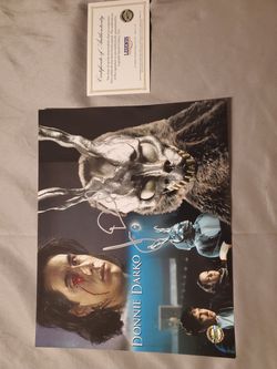 Unframed authentic autographed pics