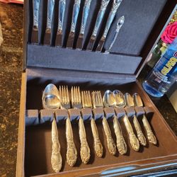 Oneida Serving For 8..MISSING SMALL FORK AND KNIFE