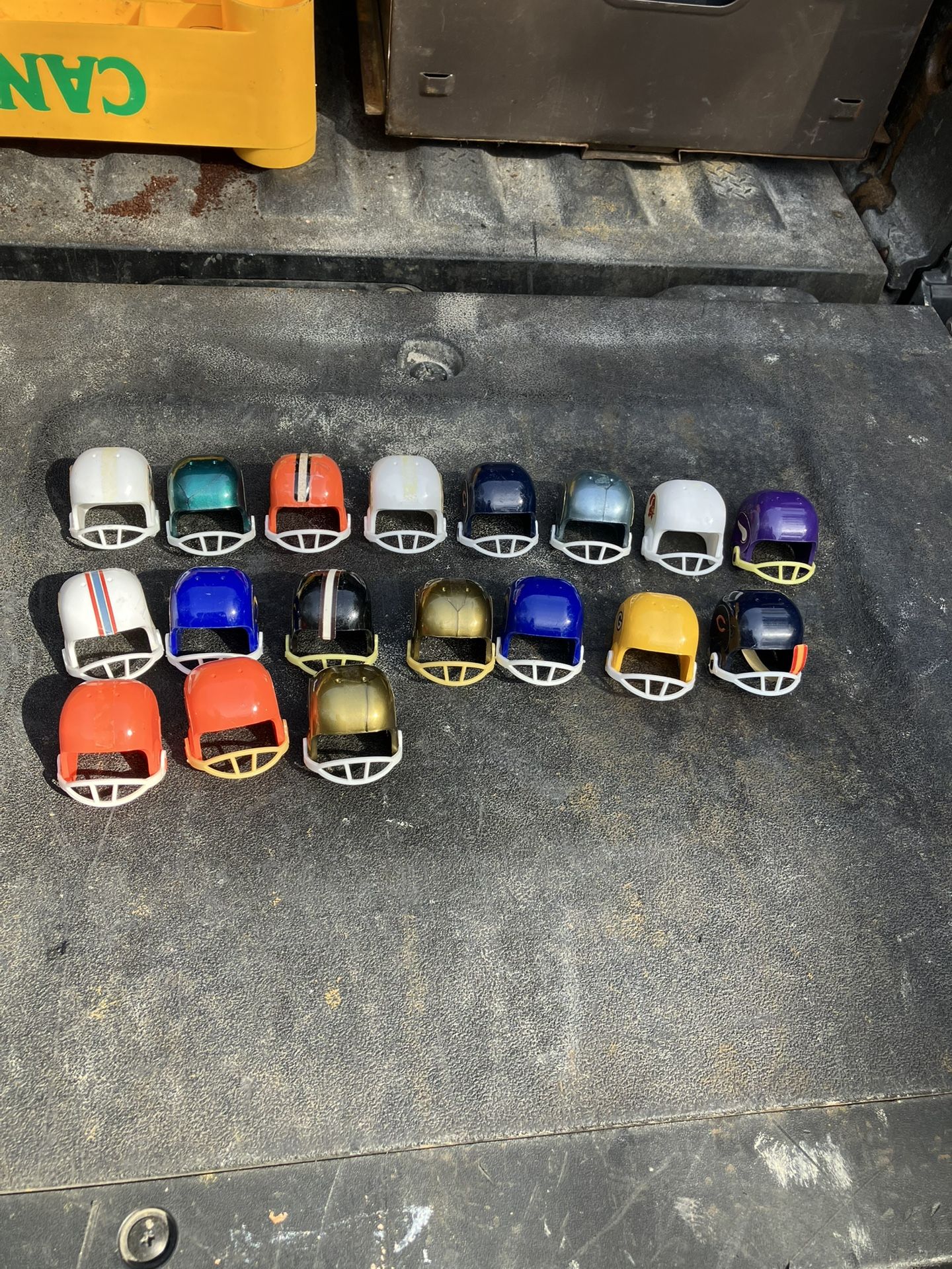 Vintage gumball machine, NFL football team helmets