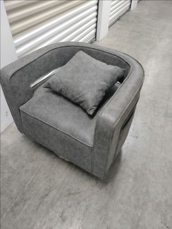 2 swival arm chairs