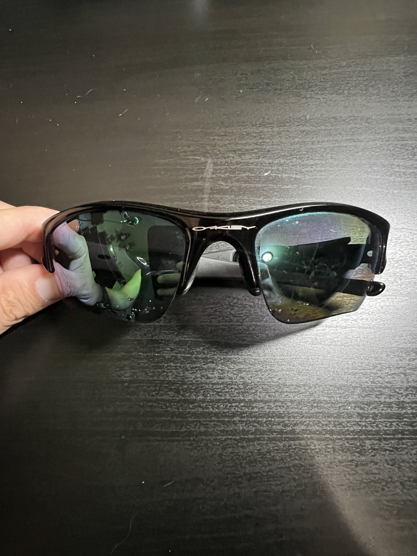 Green Oakley Polarized Sunglasses