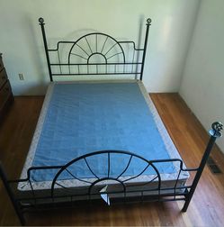 Queen size metal bed frame with head and footboard