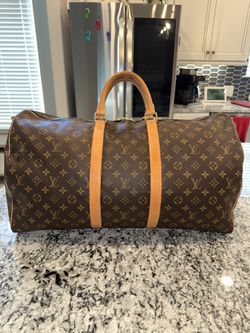 Louis Vuitton Keepall Bandoulière 55 Monogram Bag.