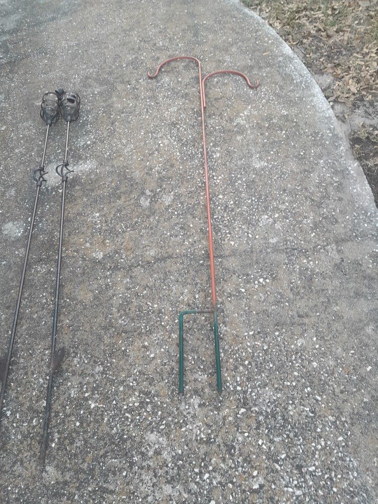 Plant Hanger & 2 TIKI TOURCHES.  PLANT HANGER 10.00 & $10.00 FOR BOTH TIKI TOURCHES.  Ok Condition PICKUP ONLY