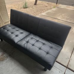 Futon $75 Black Leather Good Condition 