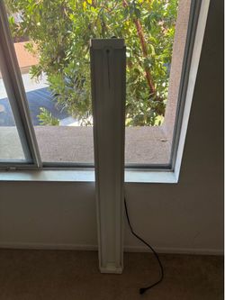 Feit Electric 4FT LED Shop Light (Model 73983) with a white housing and a 41.5-watt power rating.