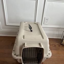 Dog carrier, bed, food tray and more