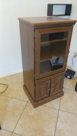 Curio/display cabinet,  on casters