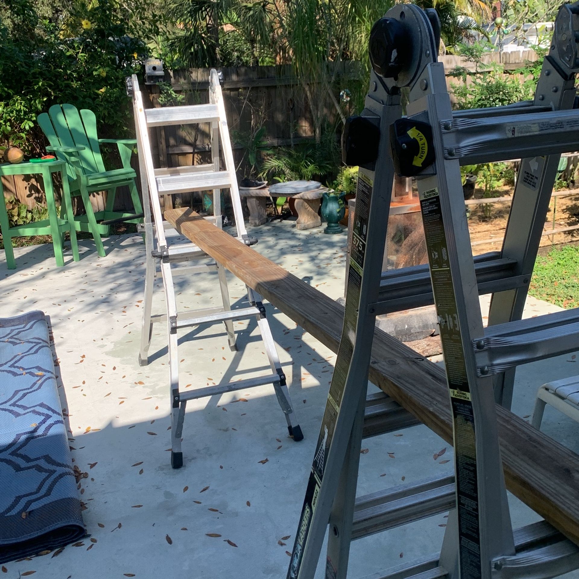 Scaffolding Ladders Set Up For Hanging Christmas Lights Or Any Other Kind Of Construction Work