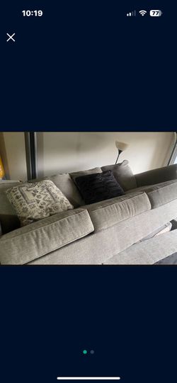 Two piece sofa, grey color with the pillow