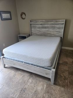 Queen bed with matching nightstand and dresser