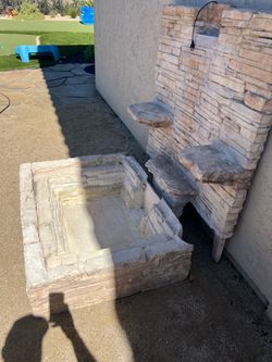 Hard plaster outdoor waterfall fountain