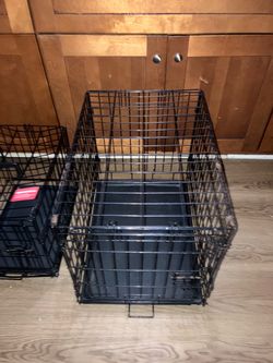 Two dog cages Ava