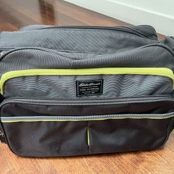 Eddie Bauer First Adventure bag in black with green accents.
