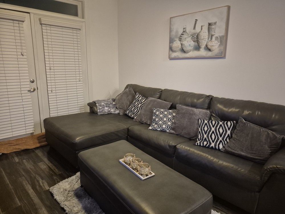 Leather Couch and Ottomon