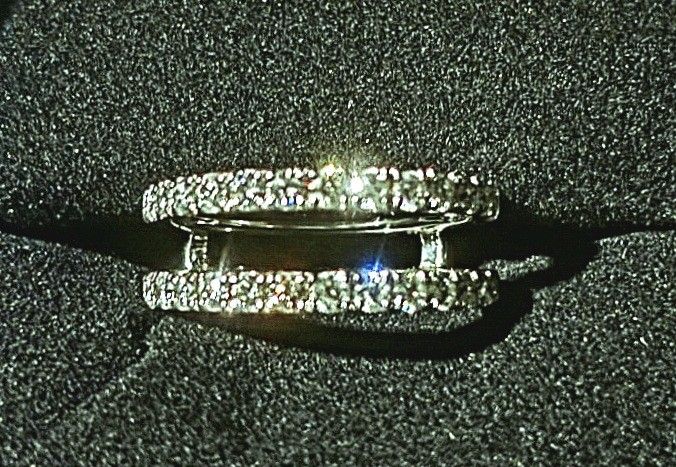 #: (contact info removed)5
1/2 CT. T.W. Certified Diamond Solitaire Enhancer in 14K White Gold (F/VS2)